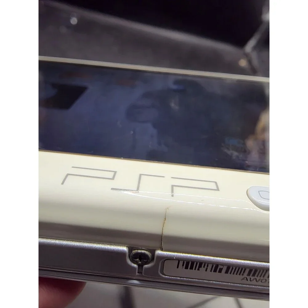 Sony PSP-2001 White Bundle – New Battery, 4 Games, Crash UMD Movie